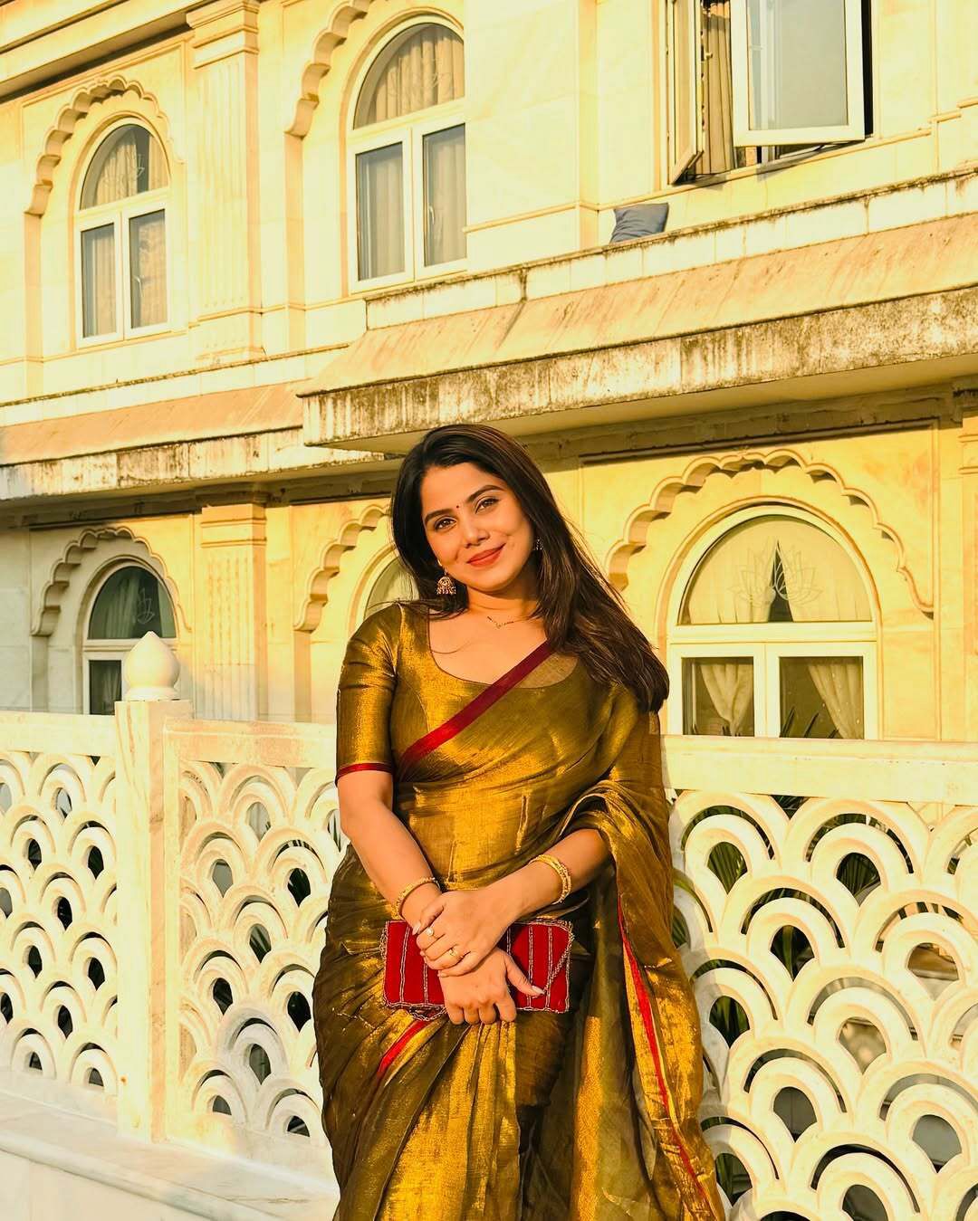Red border golden tissue saree